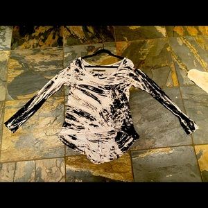 Nice drop shoulder top by Enza Costa